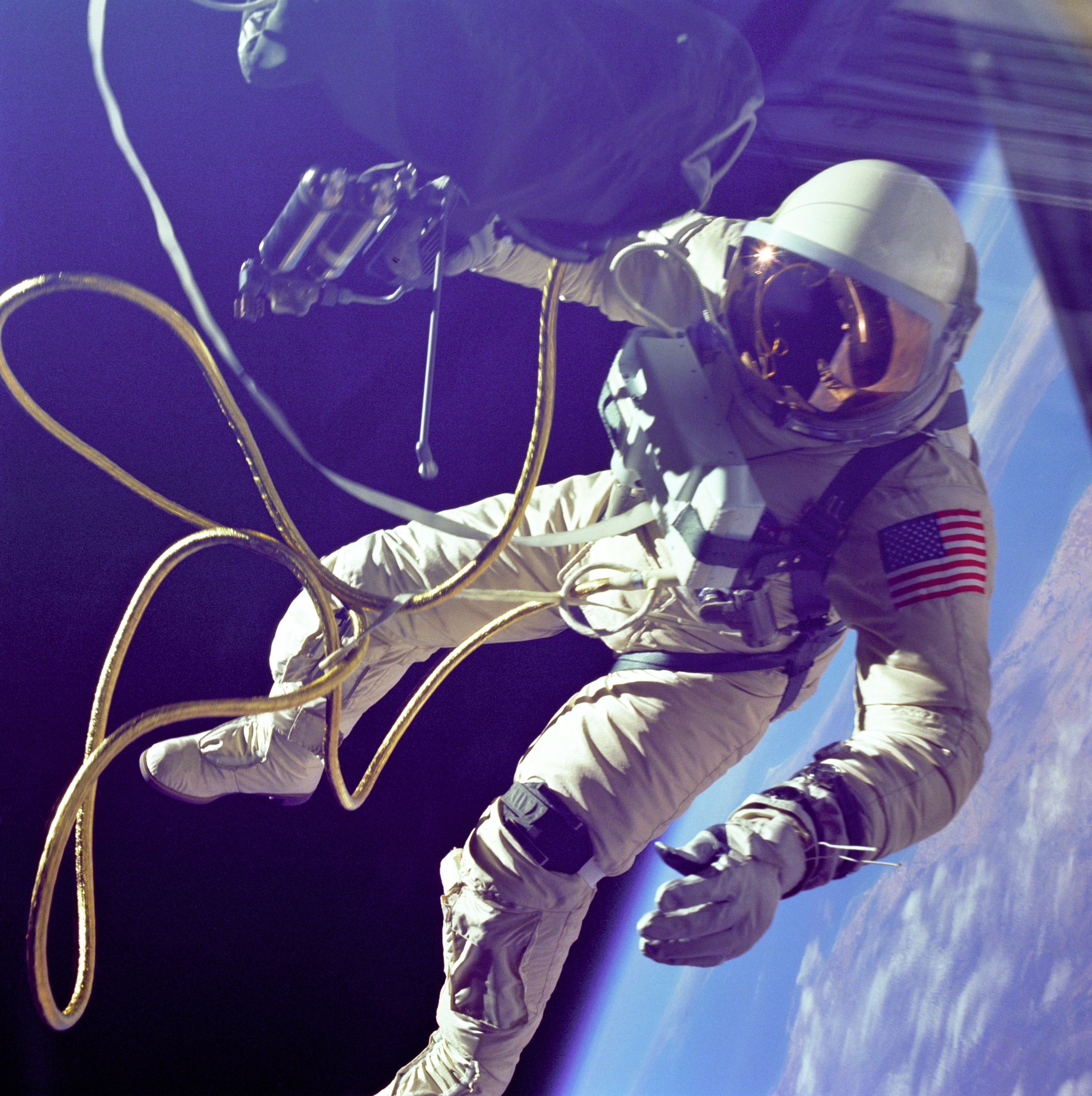Ed White performs the first US spacewalk during Gemini 4, June 3, 1965.