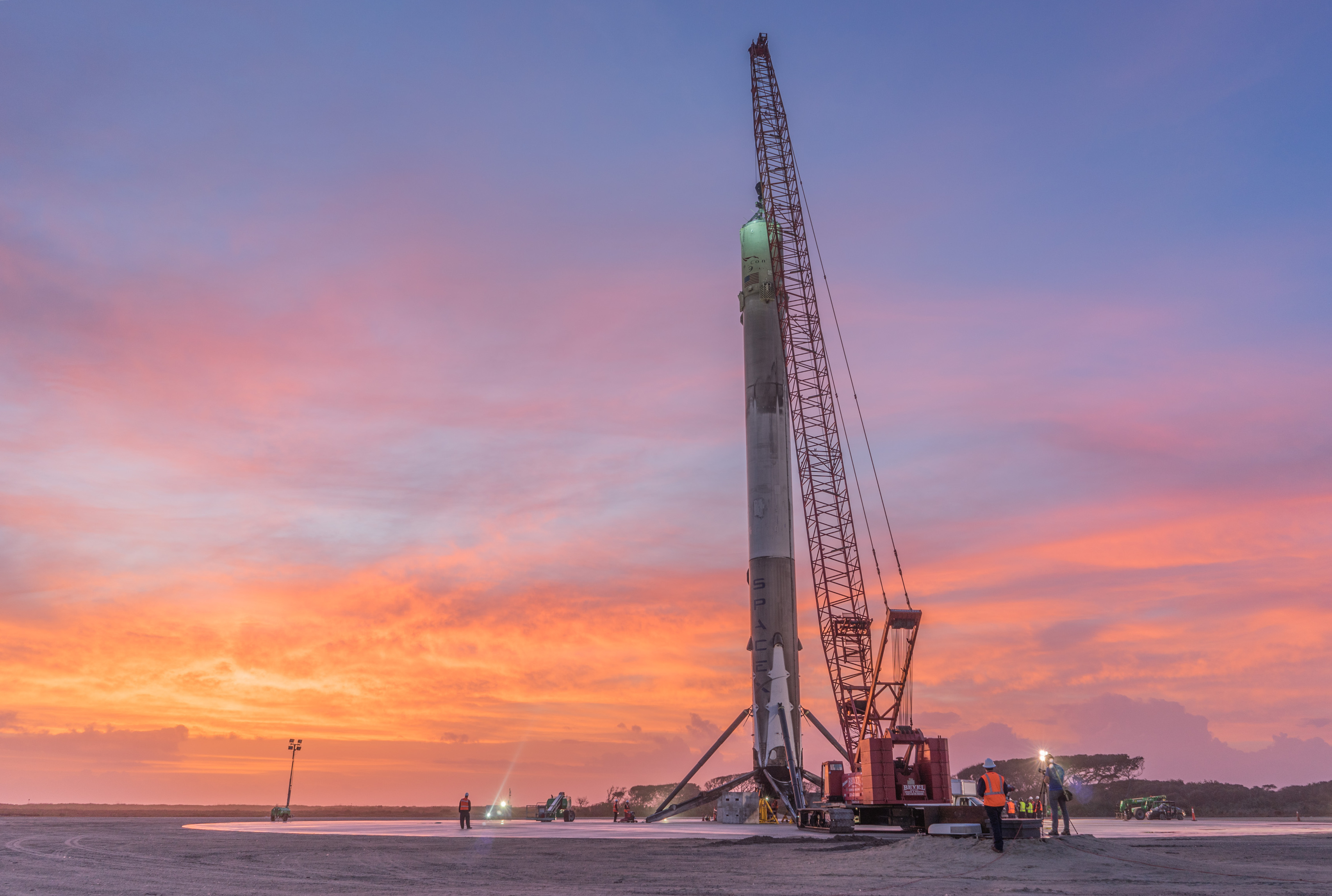Falcon 9 first stage upright at Landing Zone 1 at Cape Canaveral, after the first successful orbital-class booster landing.